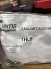 Curtis Headlight Adapter 1HL5. Fixed Price $49.99.