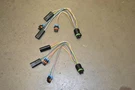 Hiniker Headlight Adapter - 38813116. Fixed Price $95.00.